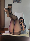 Young amateur girls really enjoy striking poses in black pantyhose